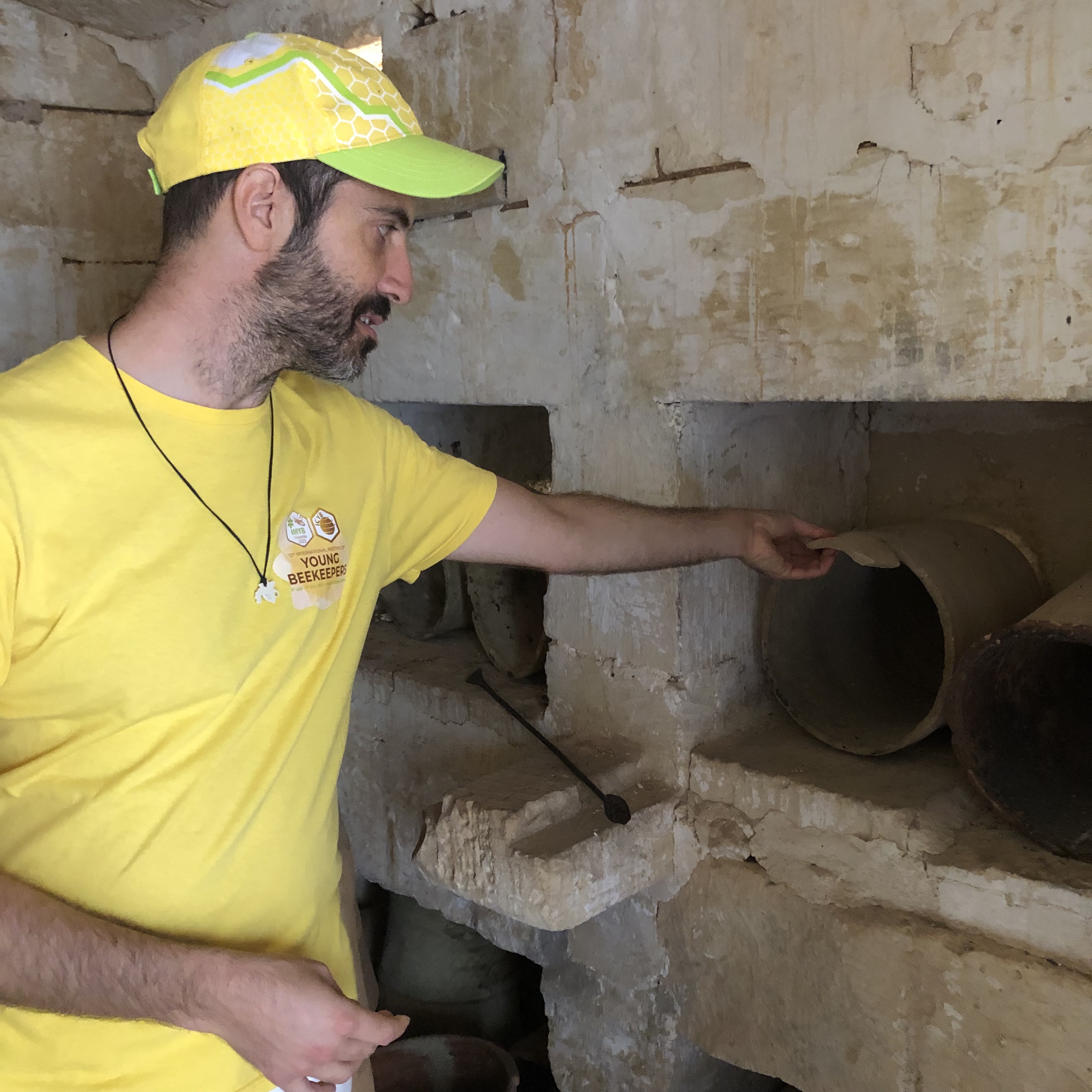 honey-house of earthenware jars as the main holding point for a nuc, wax and honey